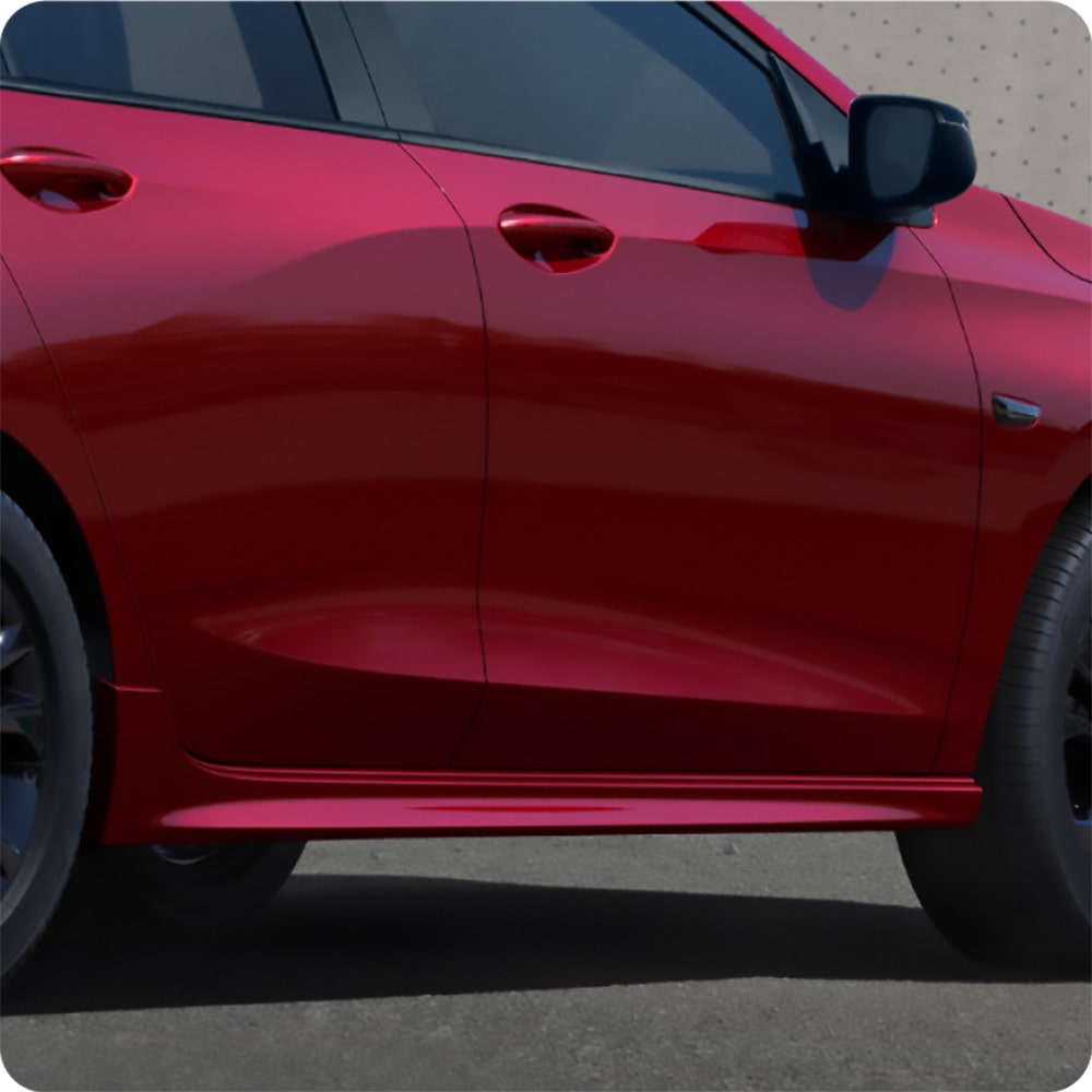 Visual lateral del Chevrolet Onix 2026 color Rojo Jinx destacando el aspecto robusto